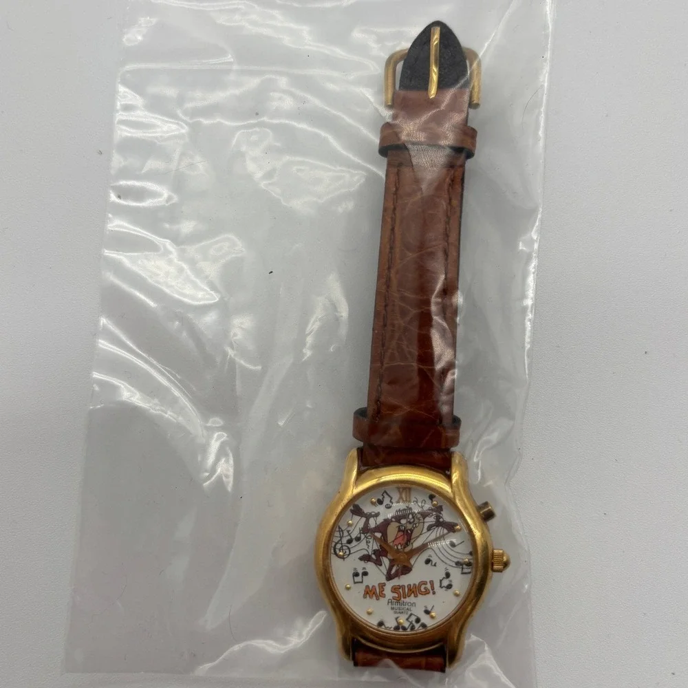 Armitron Me Sing Taz Musical Quartz‎ Watch Unisex Gold Tone Leather